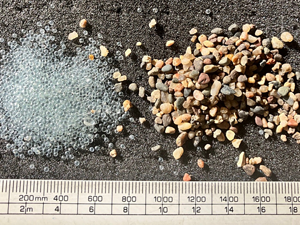 Comparison of Filter Packs in Well Design: Gravel vs. Glass Beads